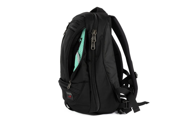 Synik 22 in Black Ballistic with Seafoam (minty green with white grid) Halcyon interior.